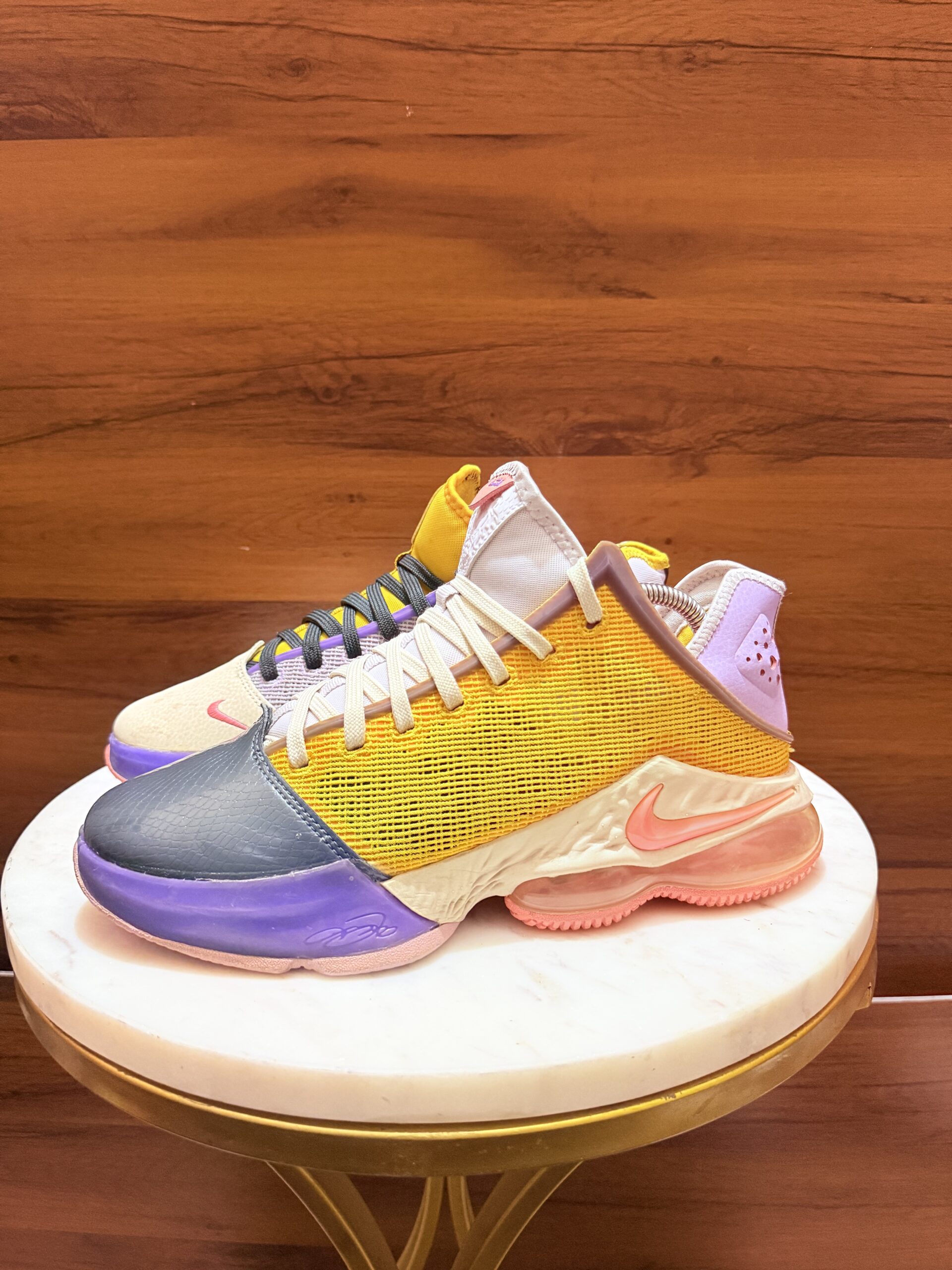 Nike LeBron 19 Low 'Mismatch' basketball shoes featuring a lilac, pink gaze, and dark smoke grey colorway