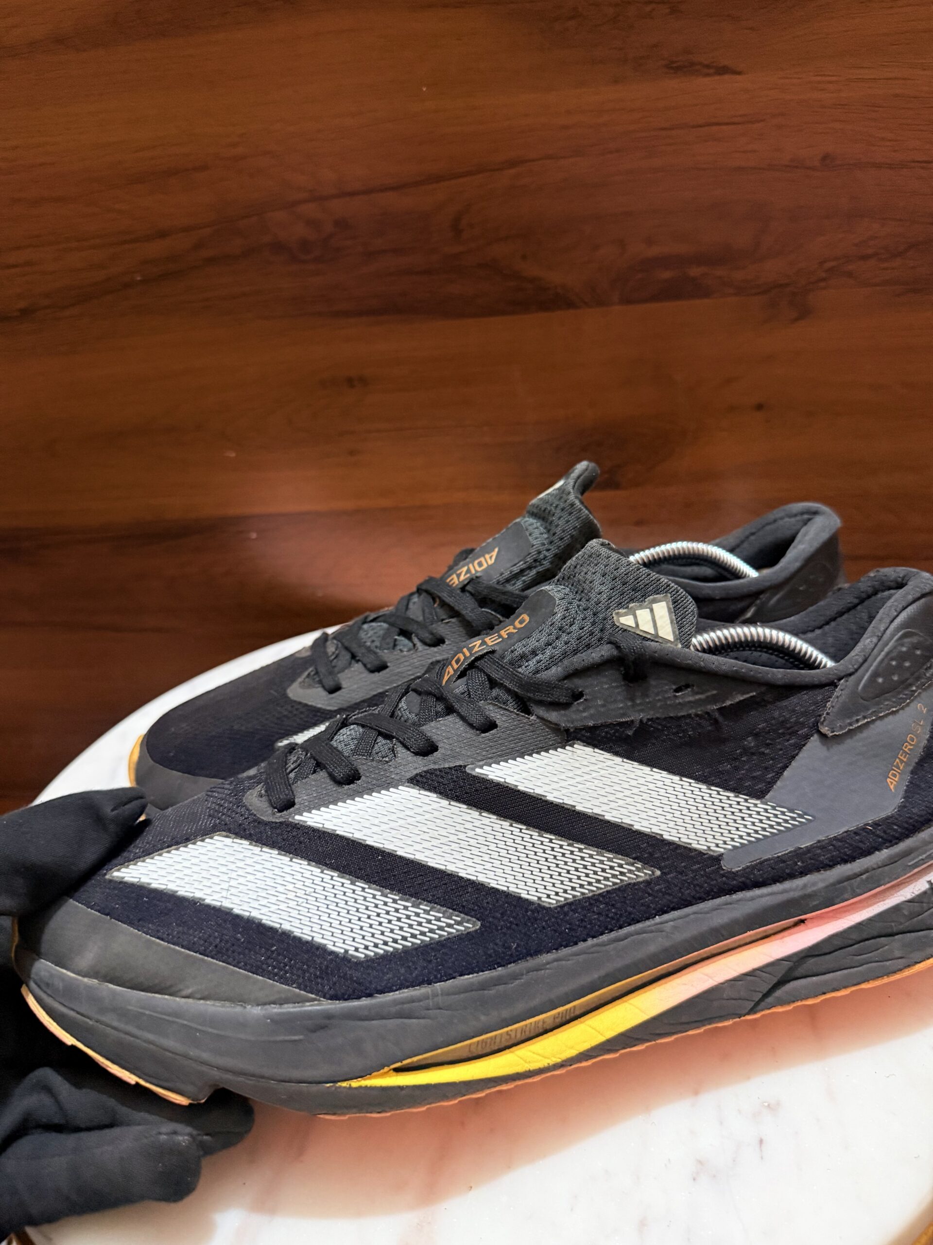 adidas Adizero SL 2 – Core Black / Cloud White / Lucid Orange